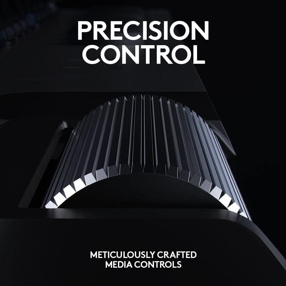 Close-up of a media control panel with 'PRECISION CONTROL' text on a black background